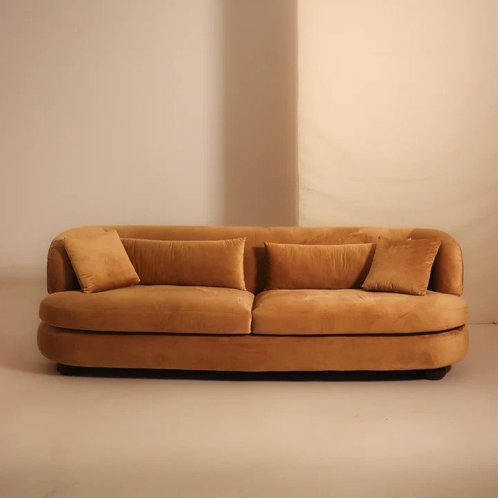 Avento Luxury Sofa crafted with solid Acacia wood and premium camel brown upholstery featuring a modern curved design.