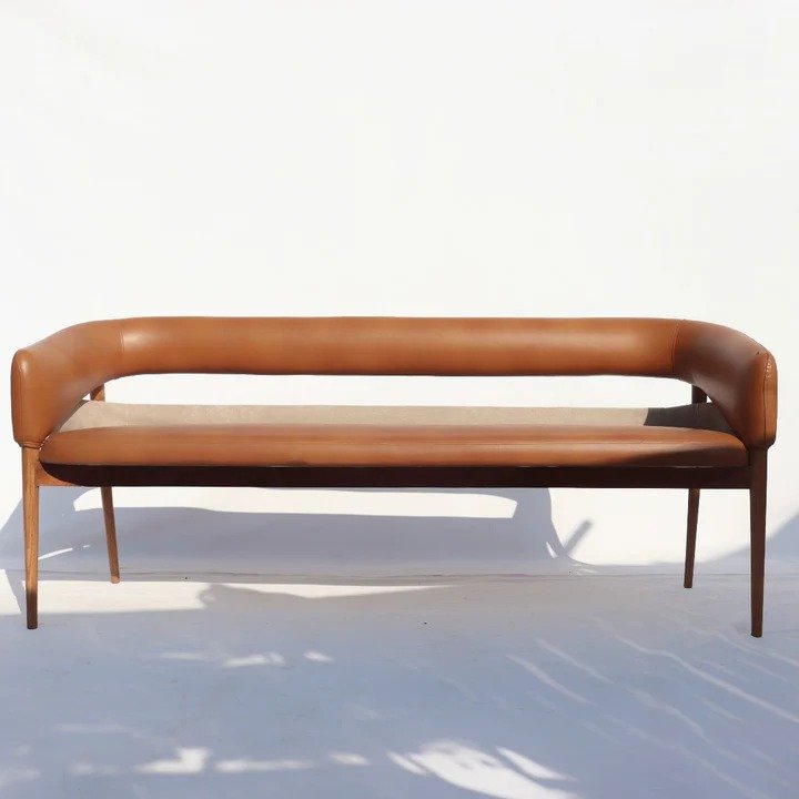 Modern 3-seater sofa crafted from solid Acacia wood with premium brown leatherette upholstery and a curved wraparound backrest.